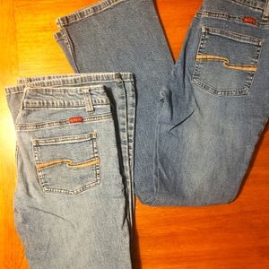 2 pairs of Tilt size 5 short/stretch jeans.